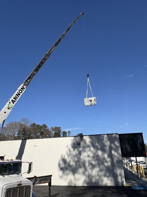 A 10-ton unit being installed onto a commercial roof