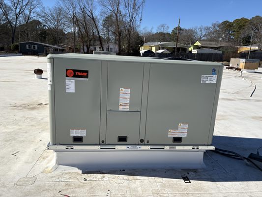 A 10-ton rooftop unit in its final installed position on a commercial customer's roof